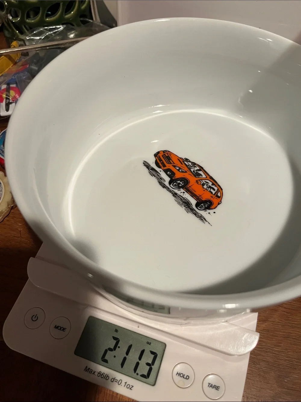 White Ceramic dog dish Bowl with Orange Car Accent and dogs